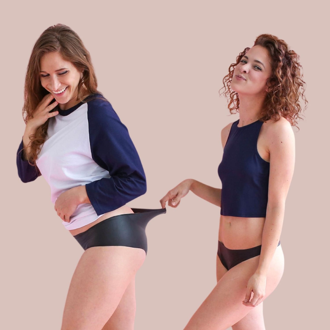 Two women model Lorals for Pleasure, latex fetish fashion for bedtime and playtime