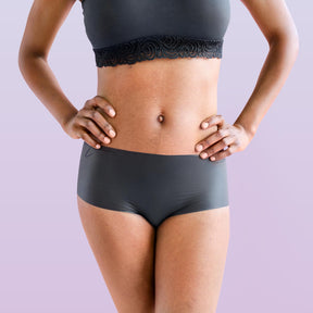 The front side of a woman wearing Lorals for STI Protection Shorties |Shortie