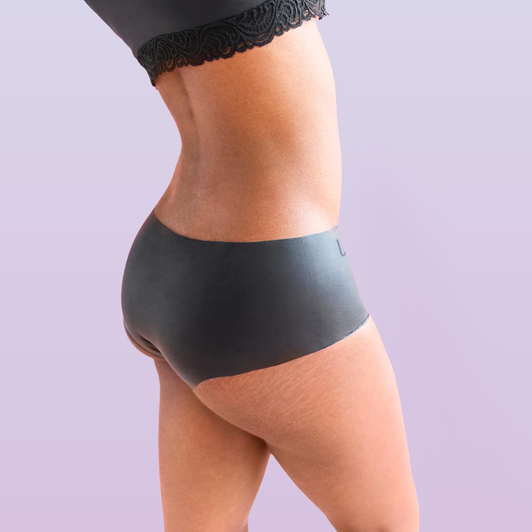 The side view of a woman wearing Lorals for STI Protection Shorties |Shortie