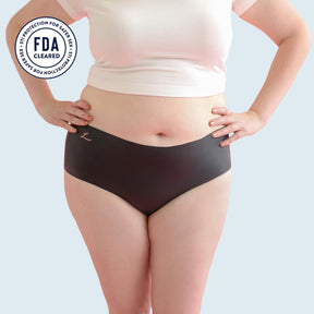 Lorals model Amanda demonstrates the front view of STI Protection Undies in Black Shorties