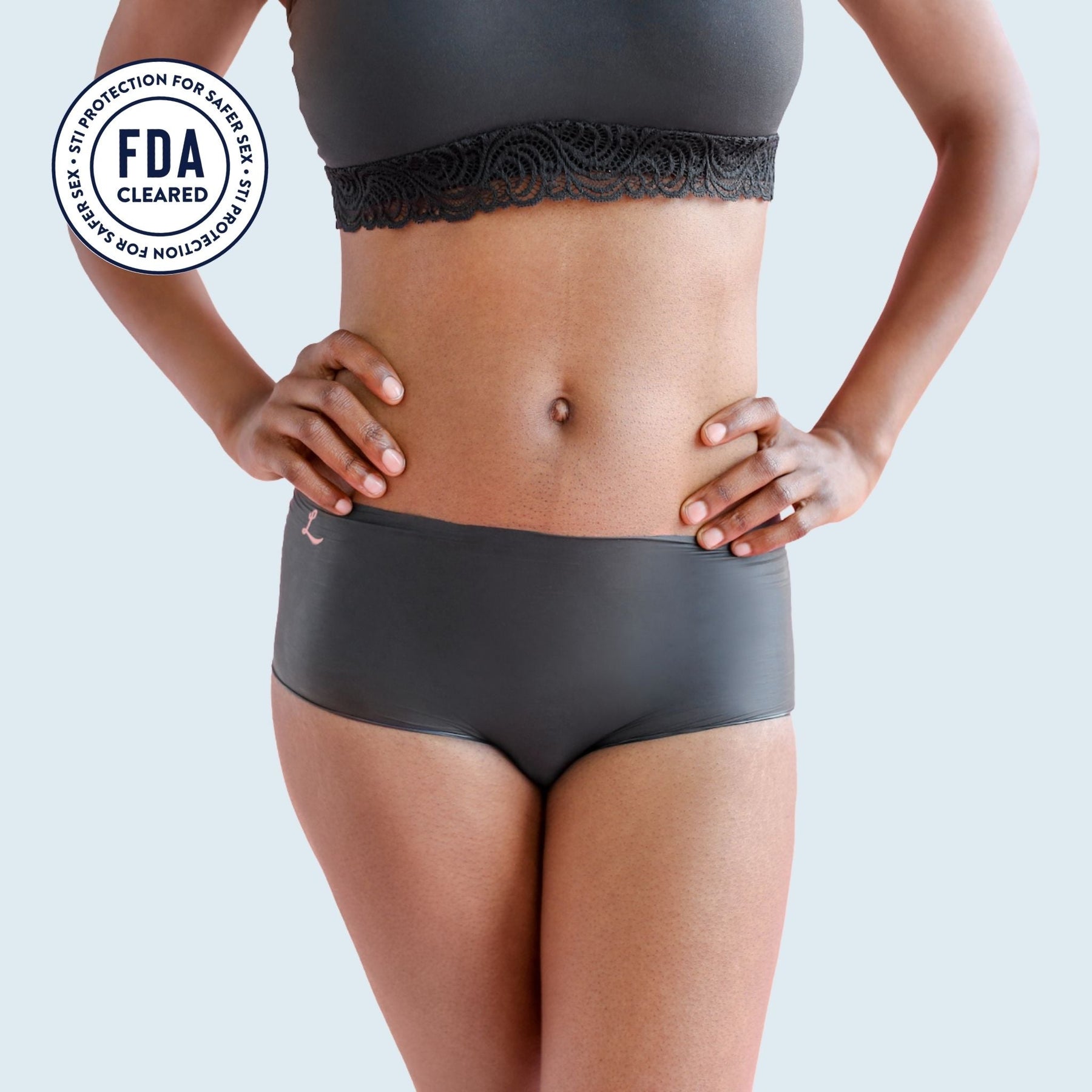 The front side of a woman wearing Lorals for STI Protection Shorties |Shortie